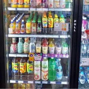 Drinks fridge stocked with various drinks including LOL Bubble Tea